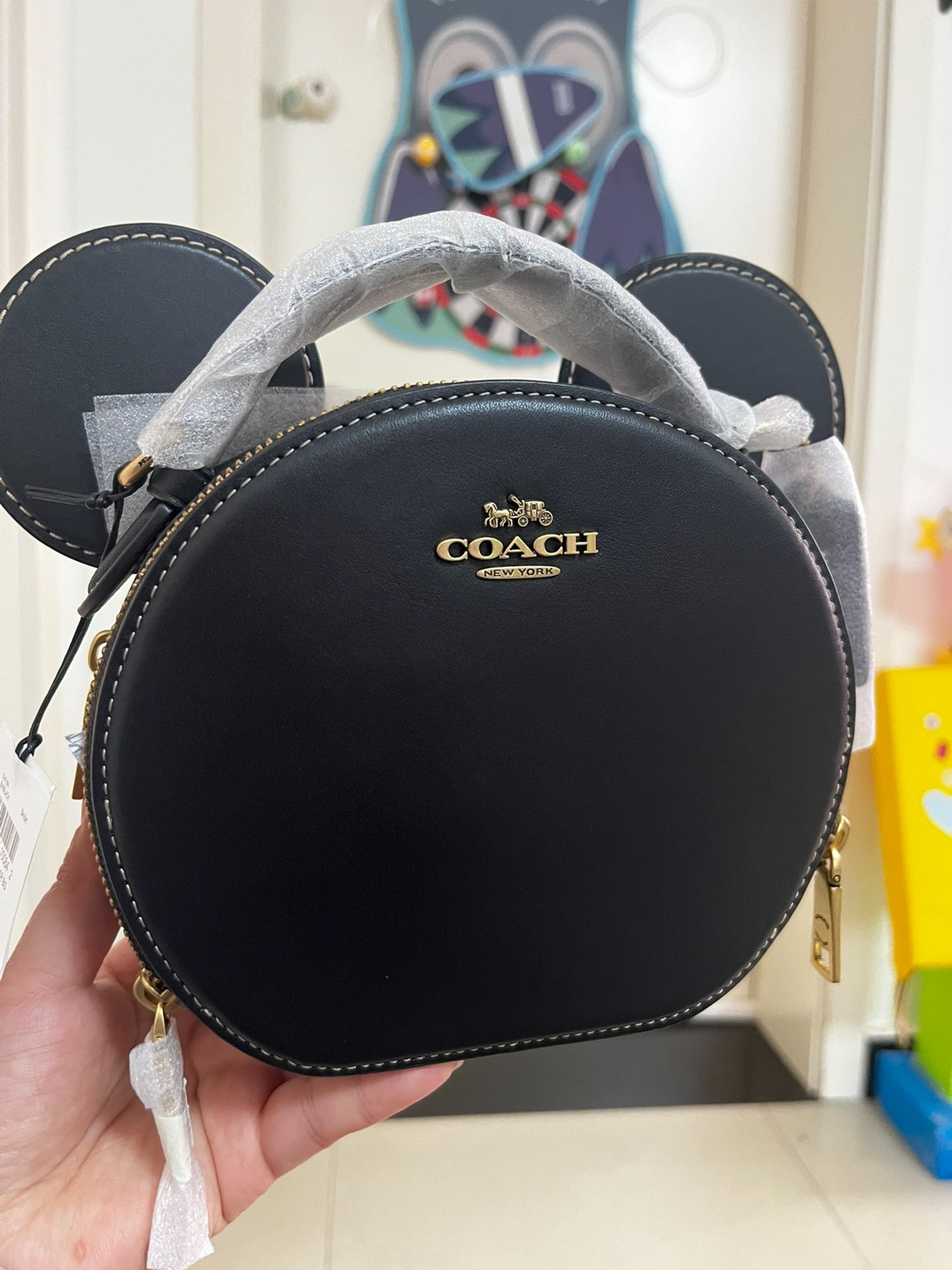 蔻驰迪士尼联名米奇头斜挎包