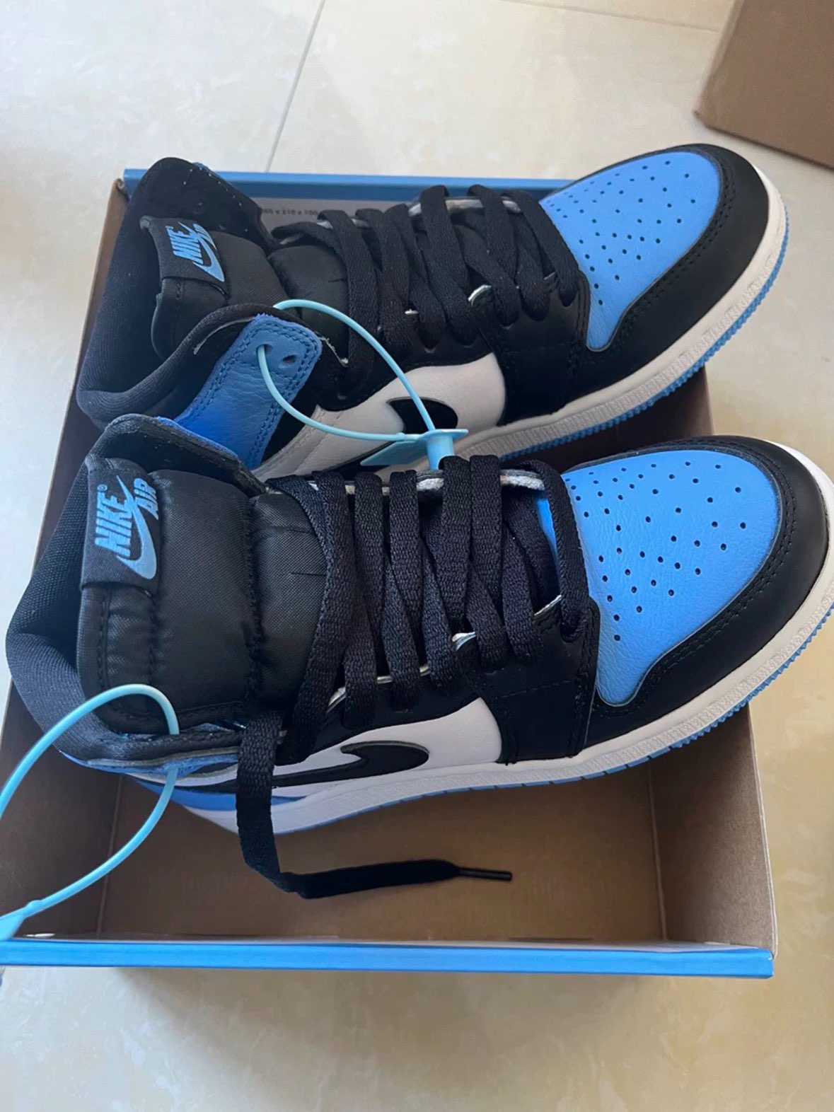 custom review-Jordan 1 Retro High OG UNC Toe GS