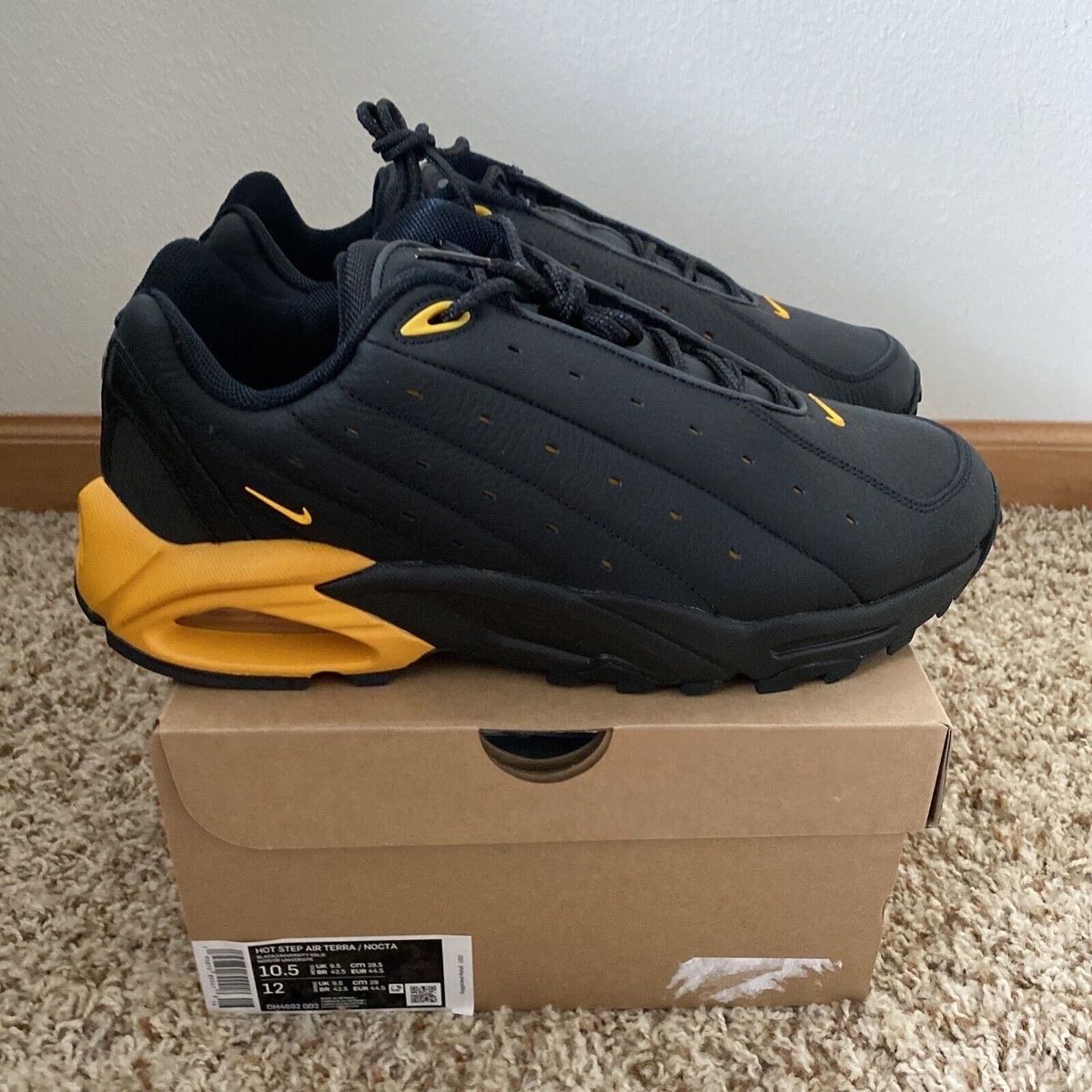 custom review-Nocta x Nike Hot Step Air Terra 'Черный Университетский Золотой' Низкий Топ Повседневная Обувь Унисекс Черный Золотой