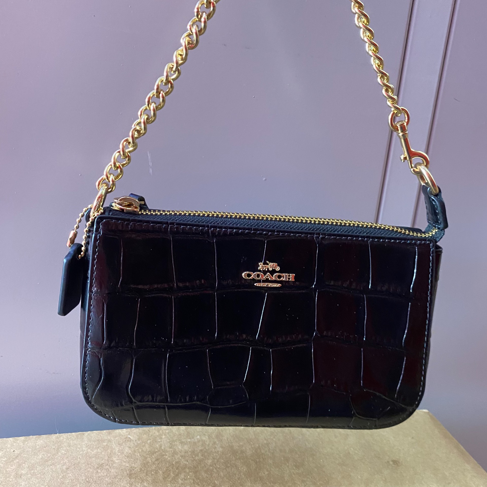 蔻驰麻将腋下包