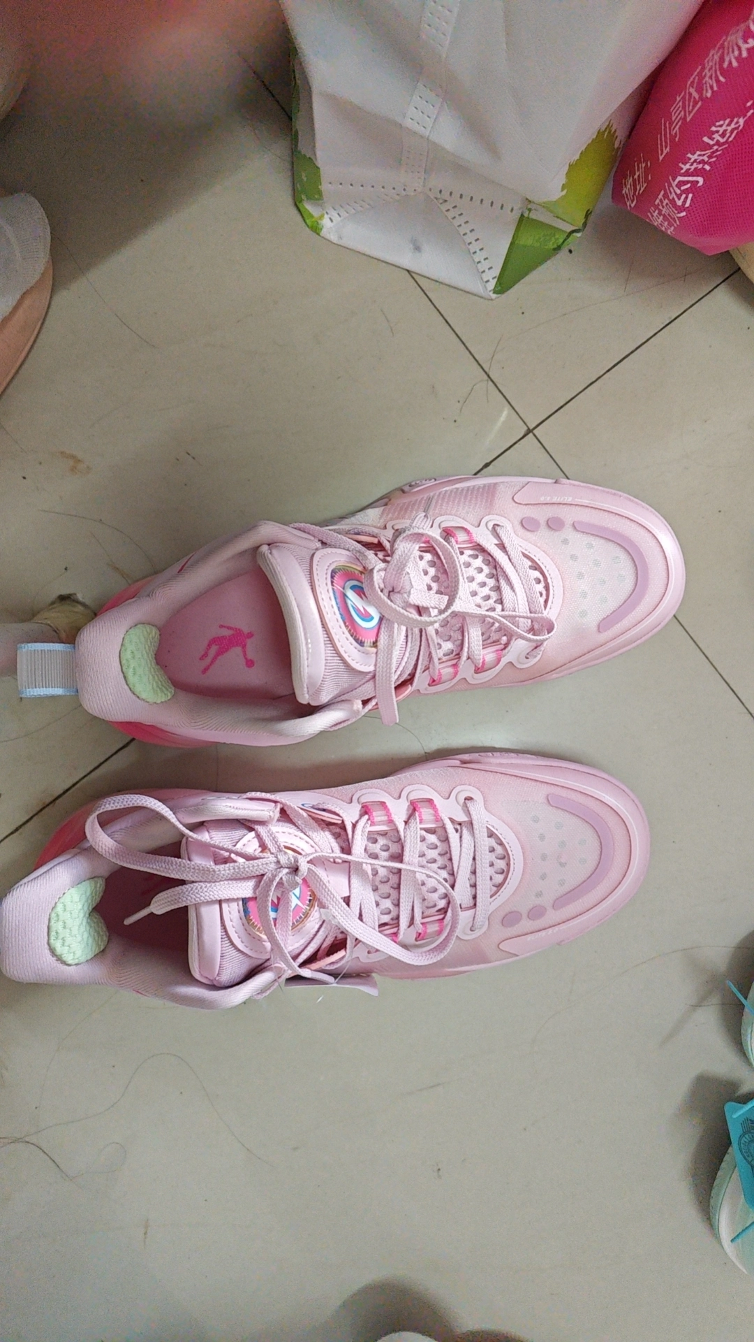 custom review-QIAODAN Busters 5ELITE Basketball Shoes Men's Low top Pink
