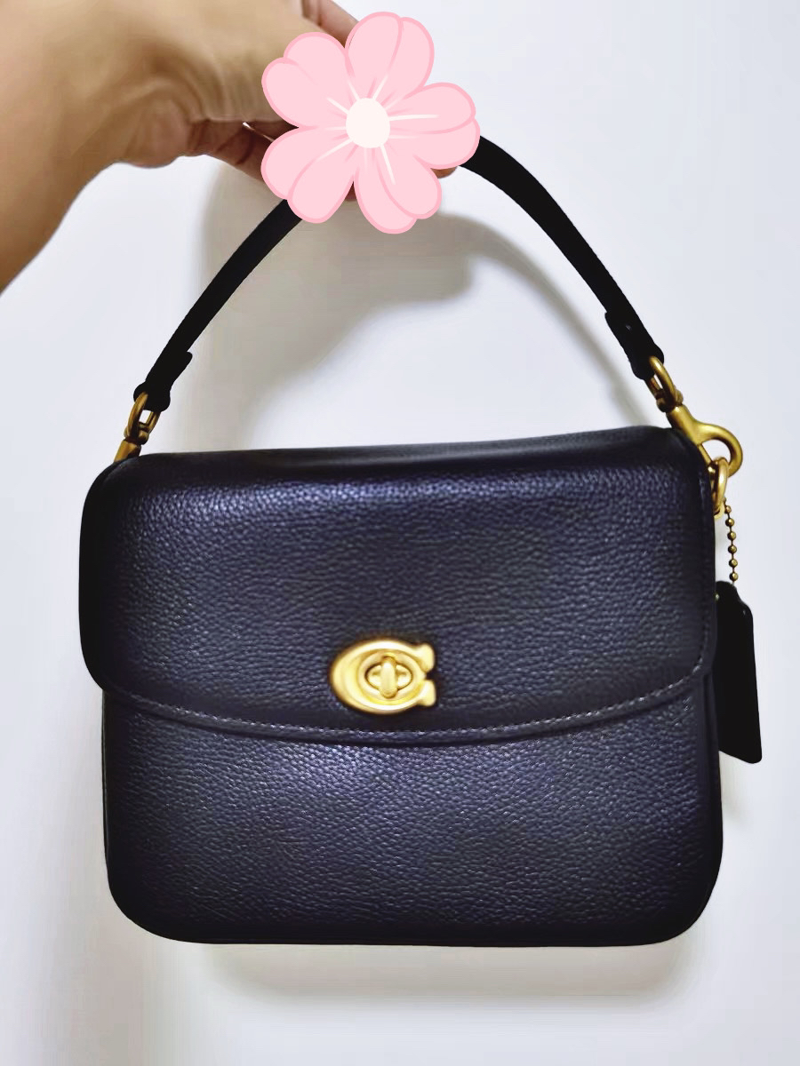 蔻驰黑色包包👜