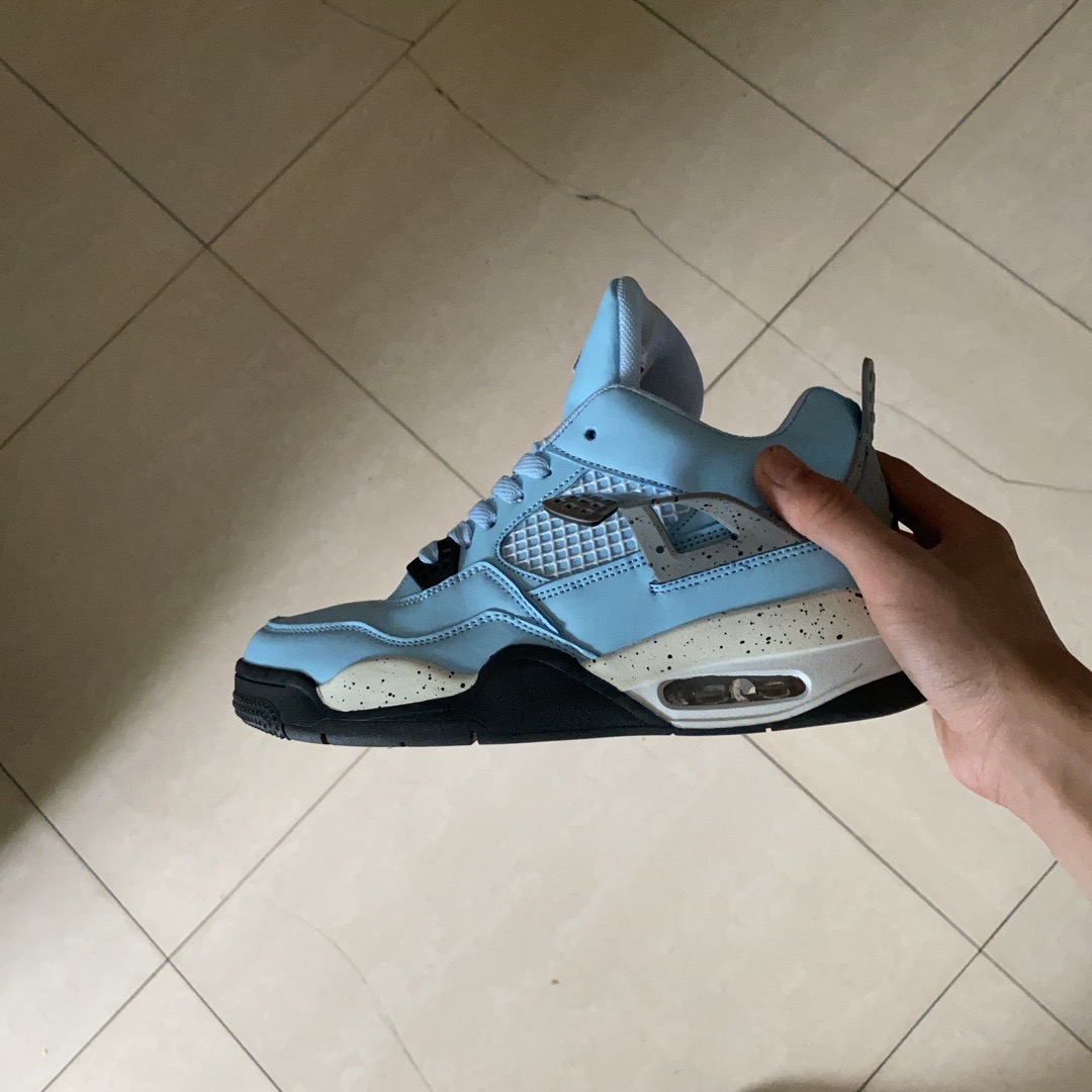 fake university blue jordan 4