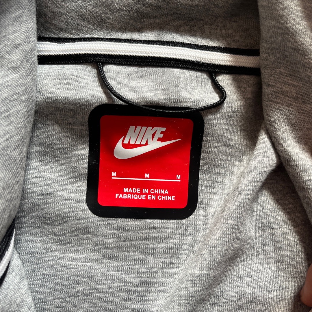 nike hoodie red tag