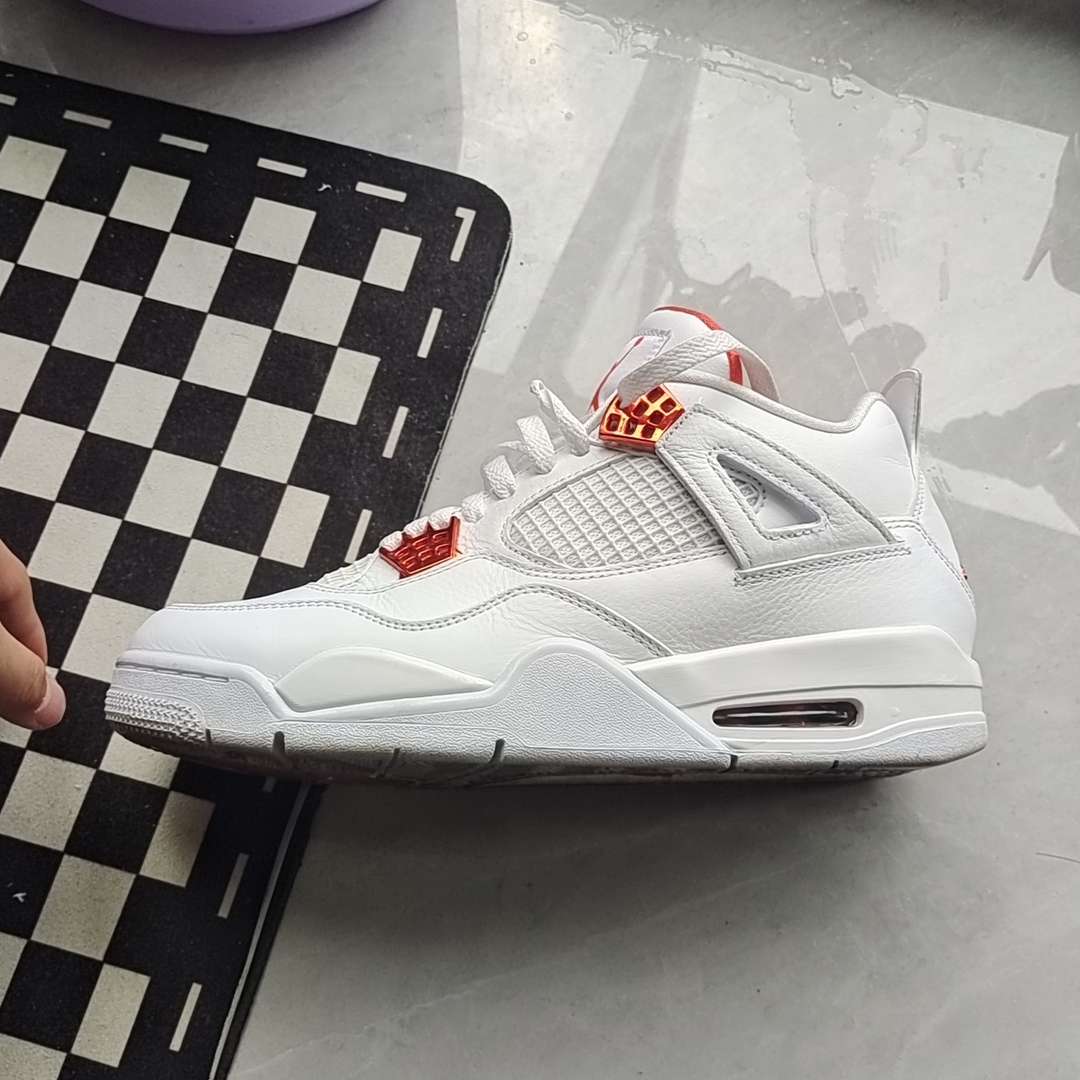 jordan 4 metallic red fake vs real