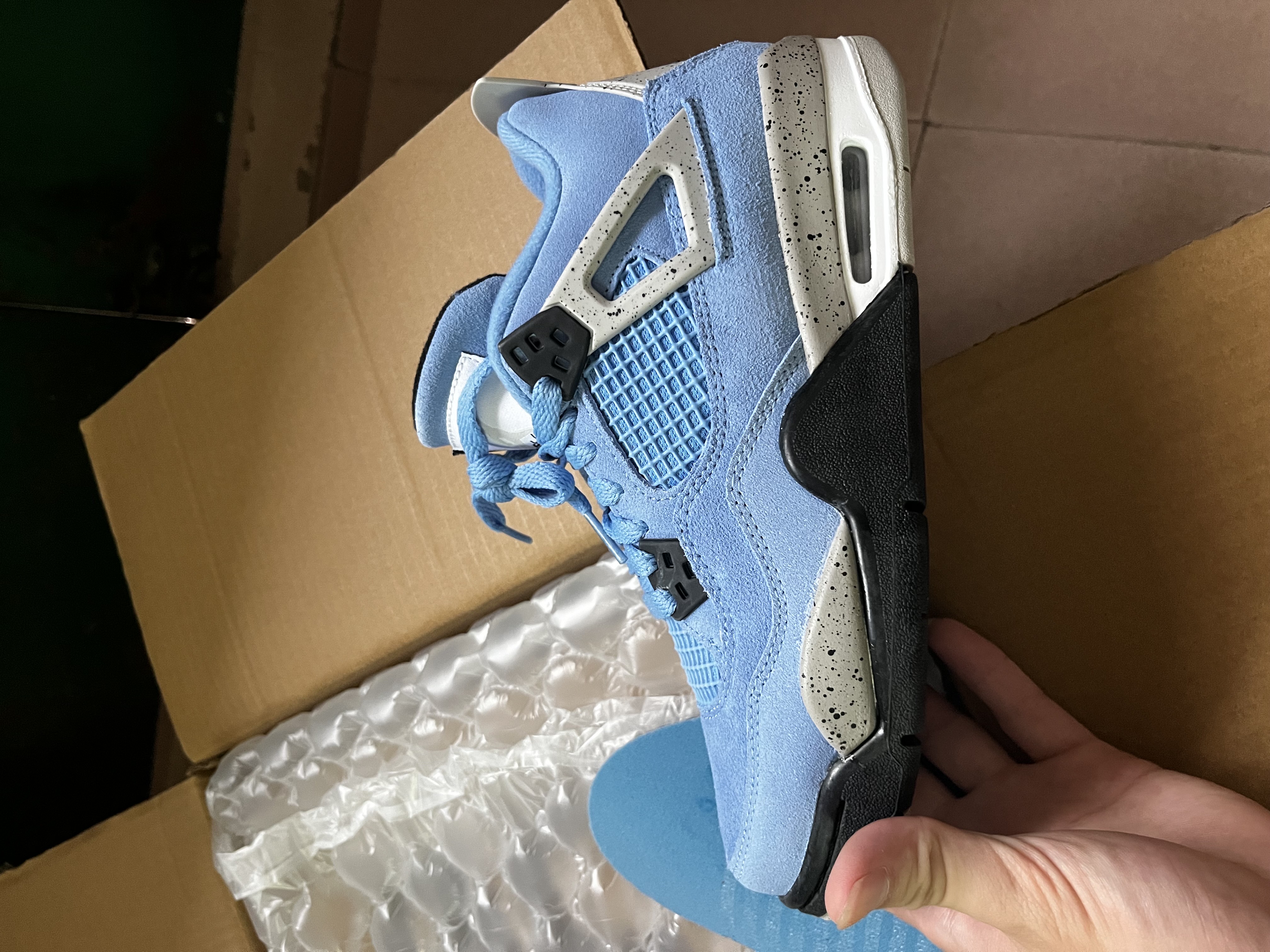 fake university blue jordan 4