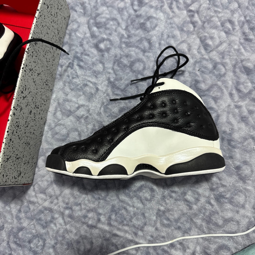 jordan 13 black cat fake vs real