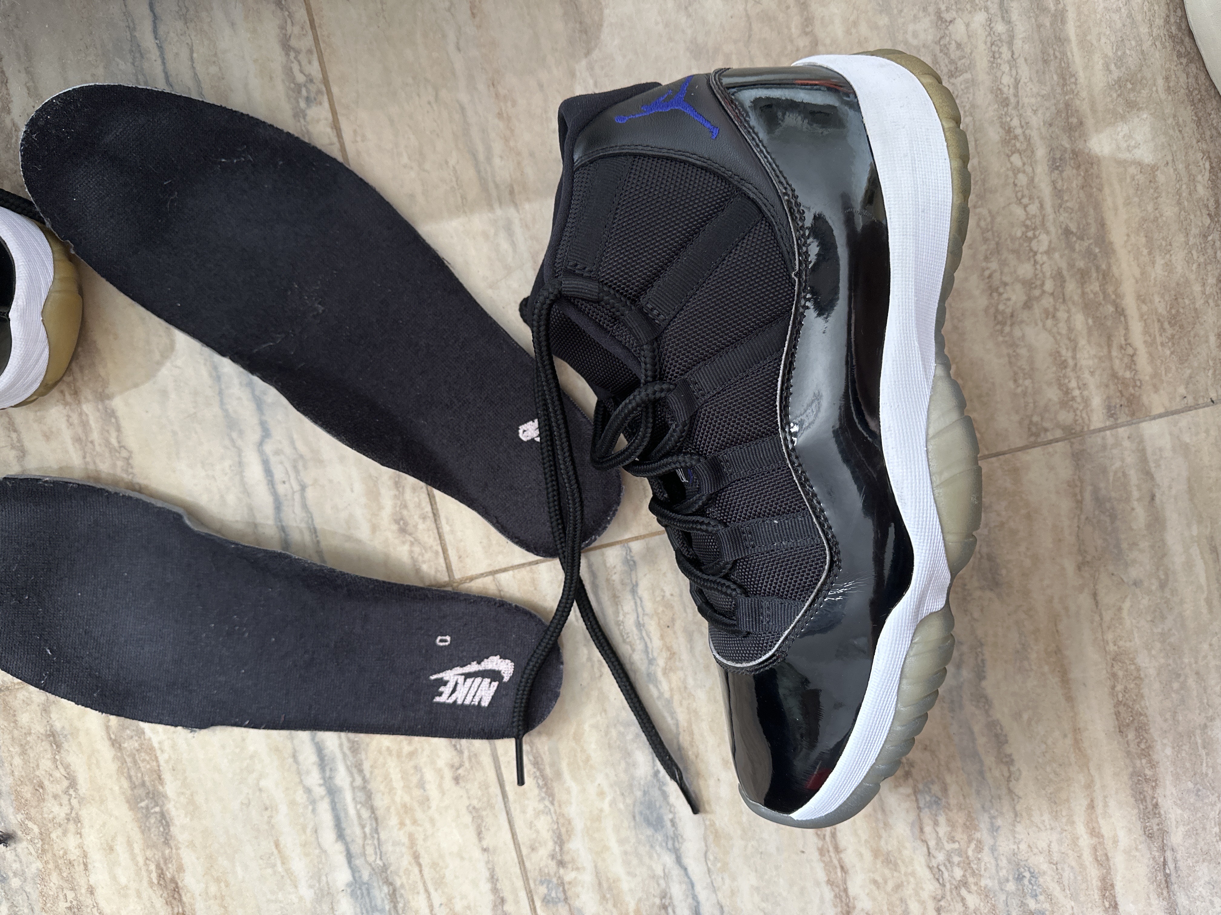 how to spot fake jordan 11 space jam