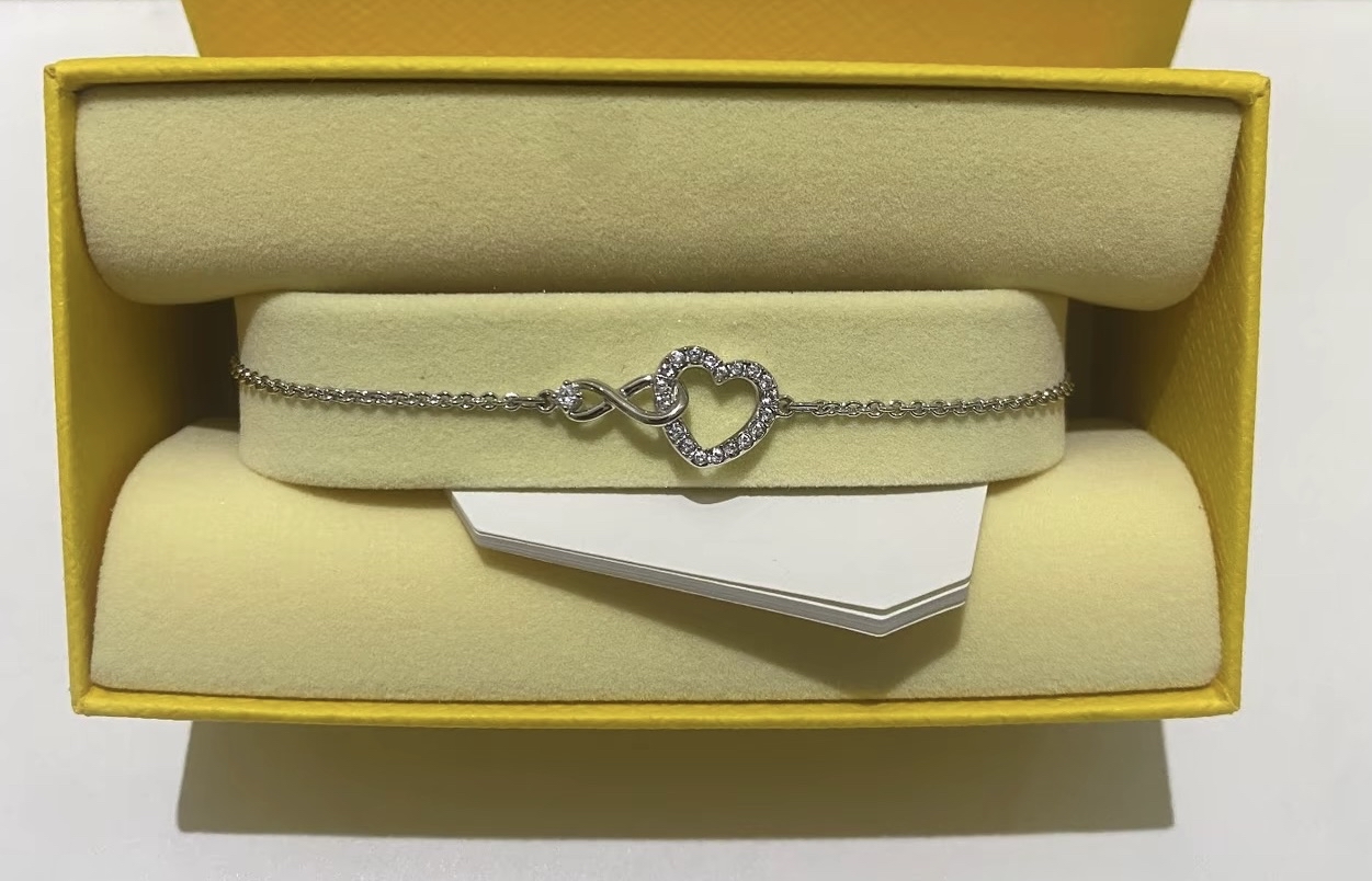 custom review-Swarovski Hyperbola Браслеты Женские Белые