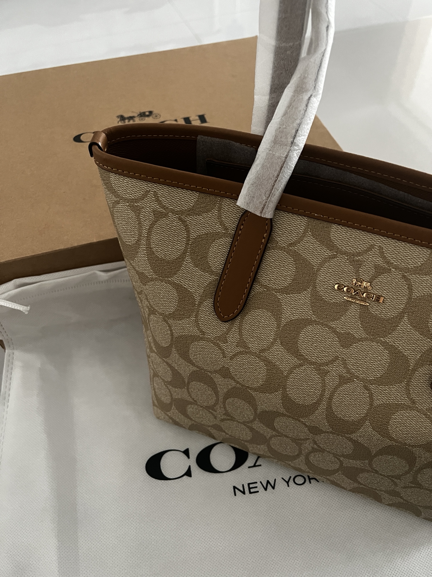 蔻驰单肩托特包