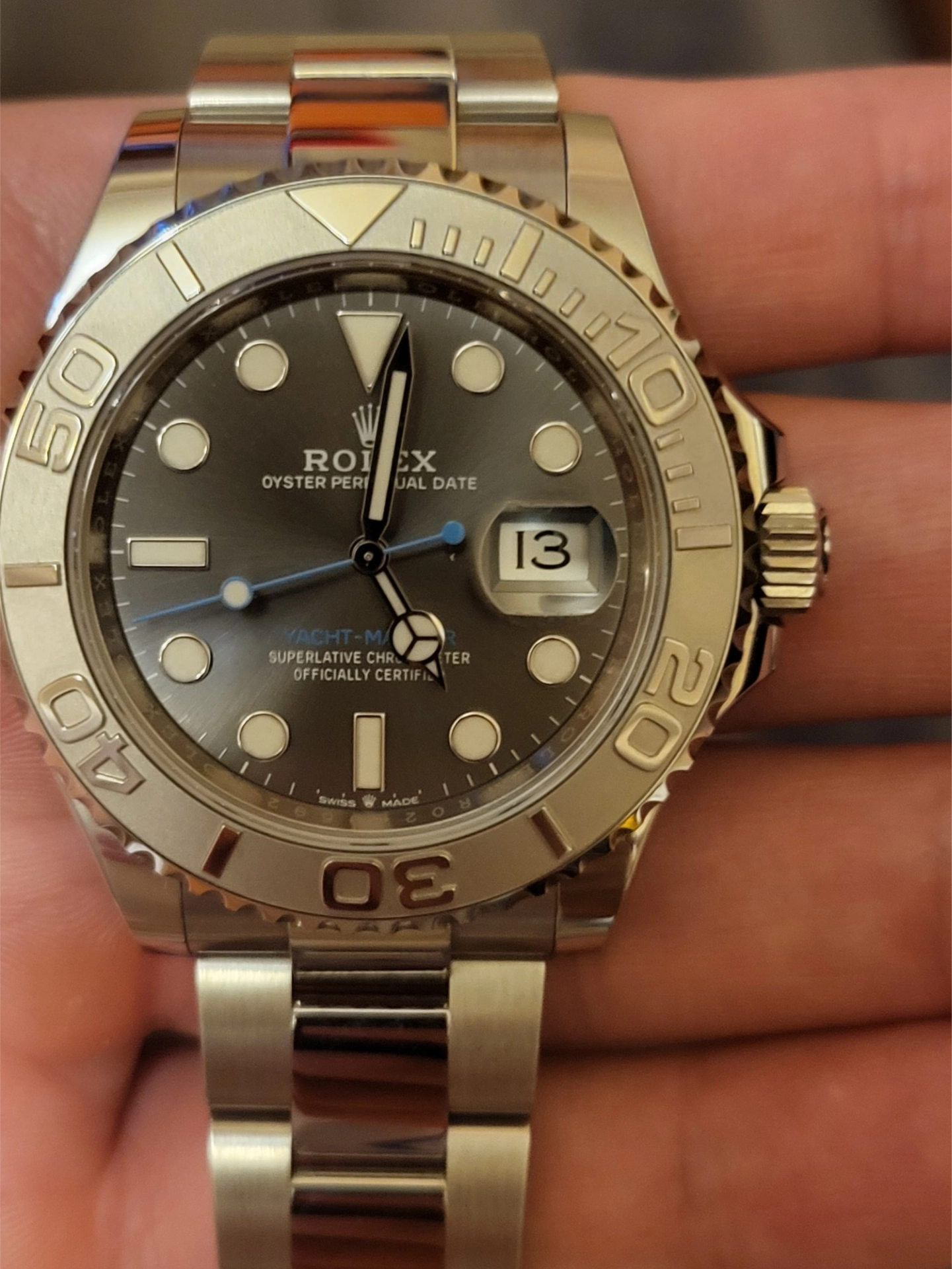 那枚蓝针画龙点睛rolex灰游艇