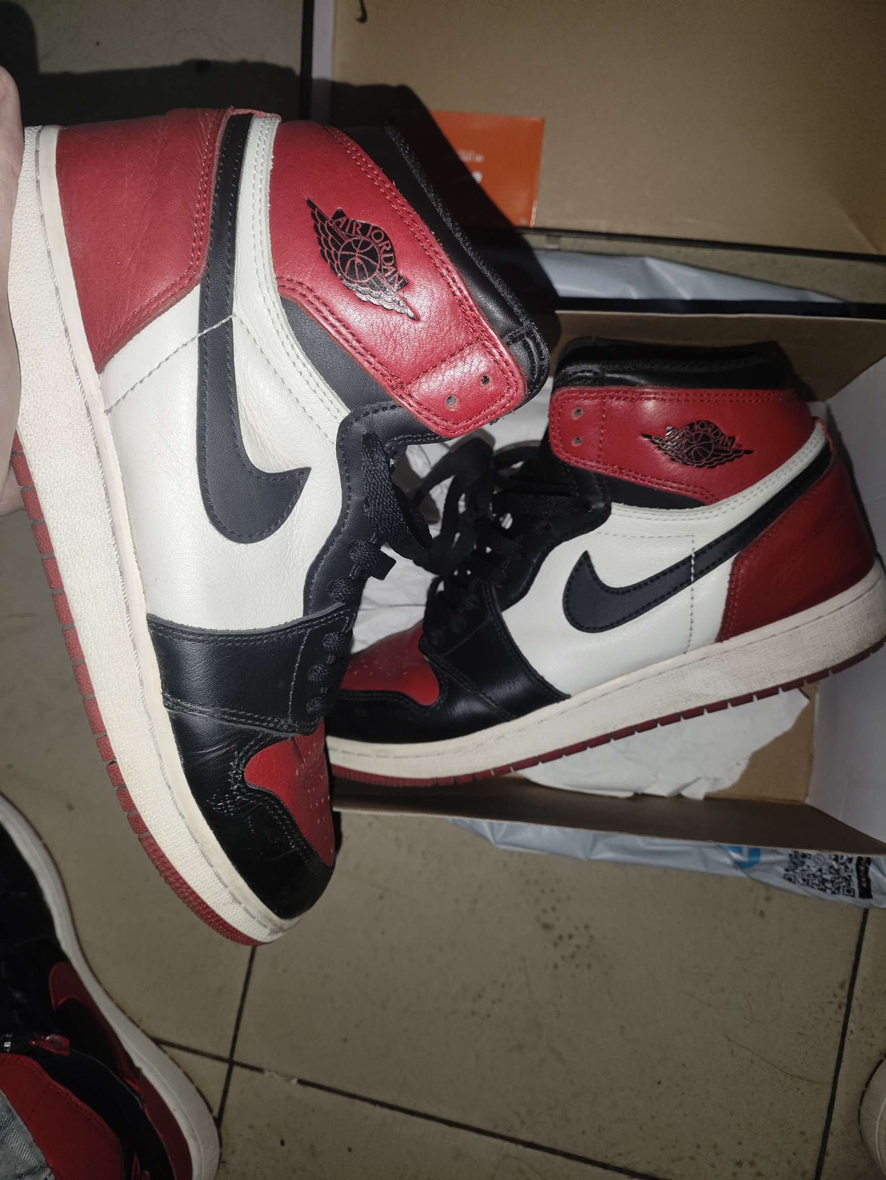 how to spot fake jordan 1 bred toe