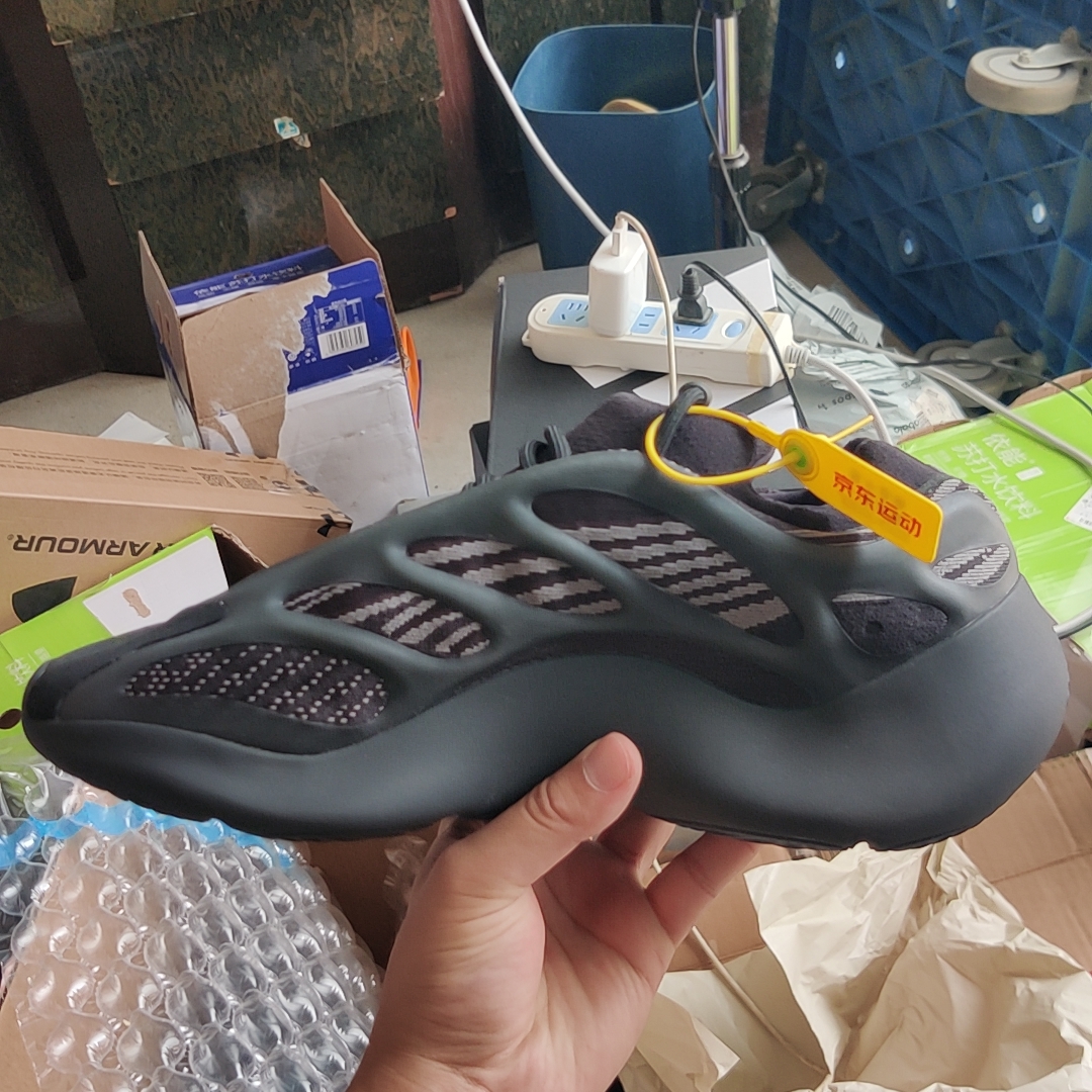 green and black yeezy 700