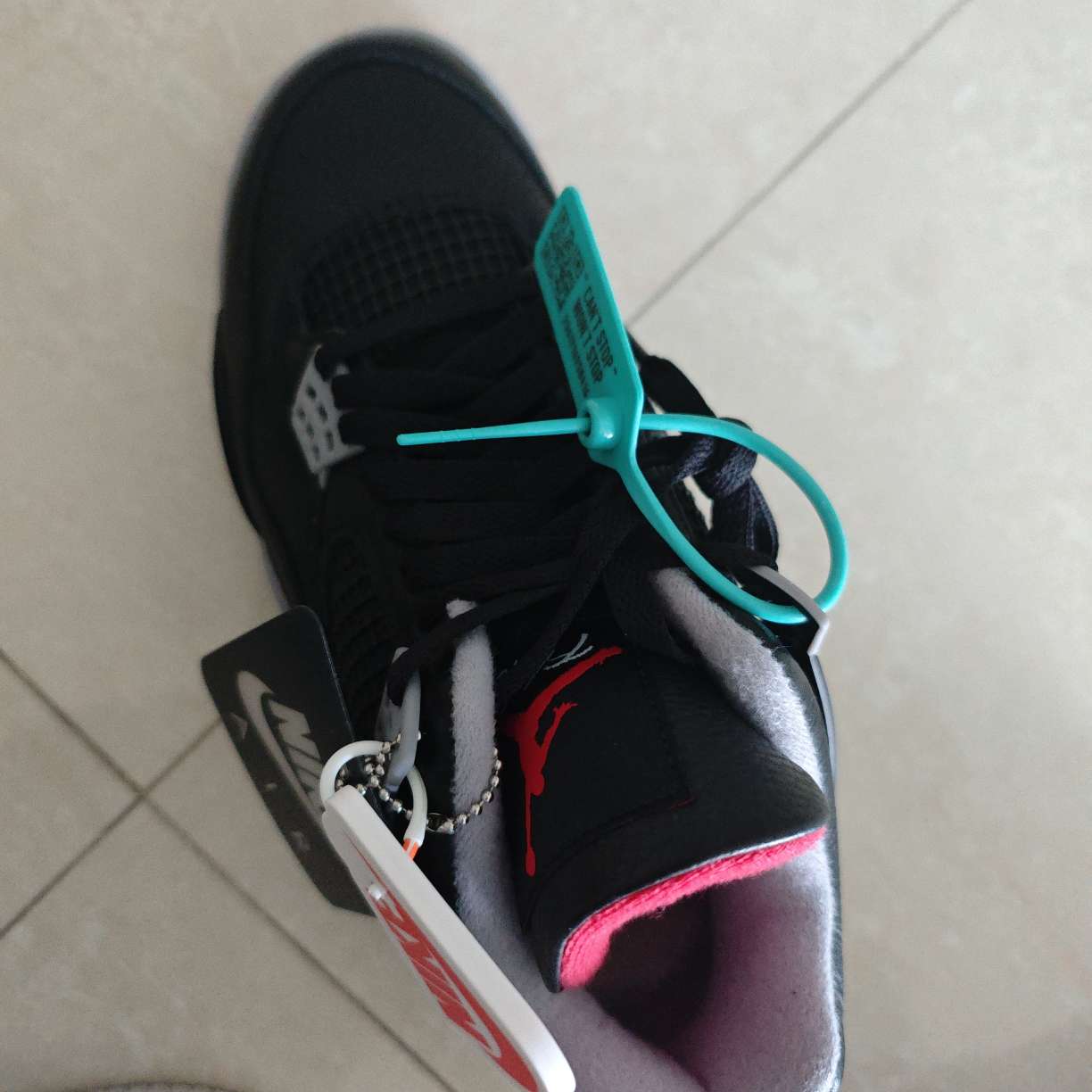 bred 4s real vs fake