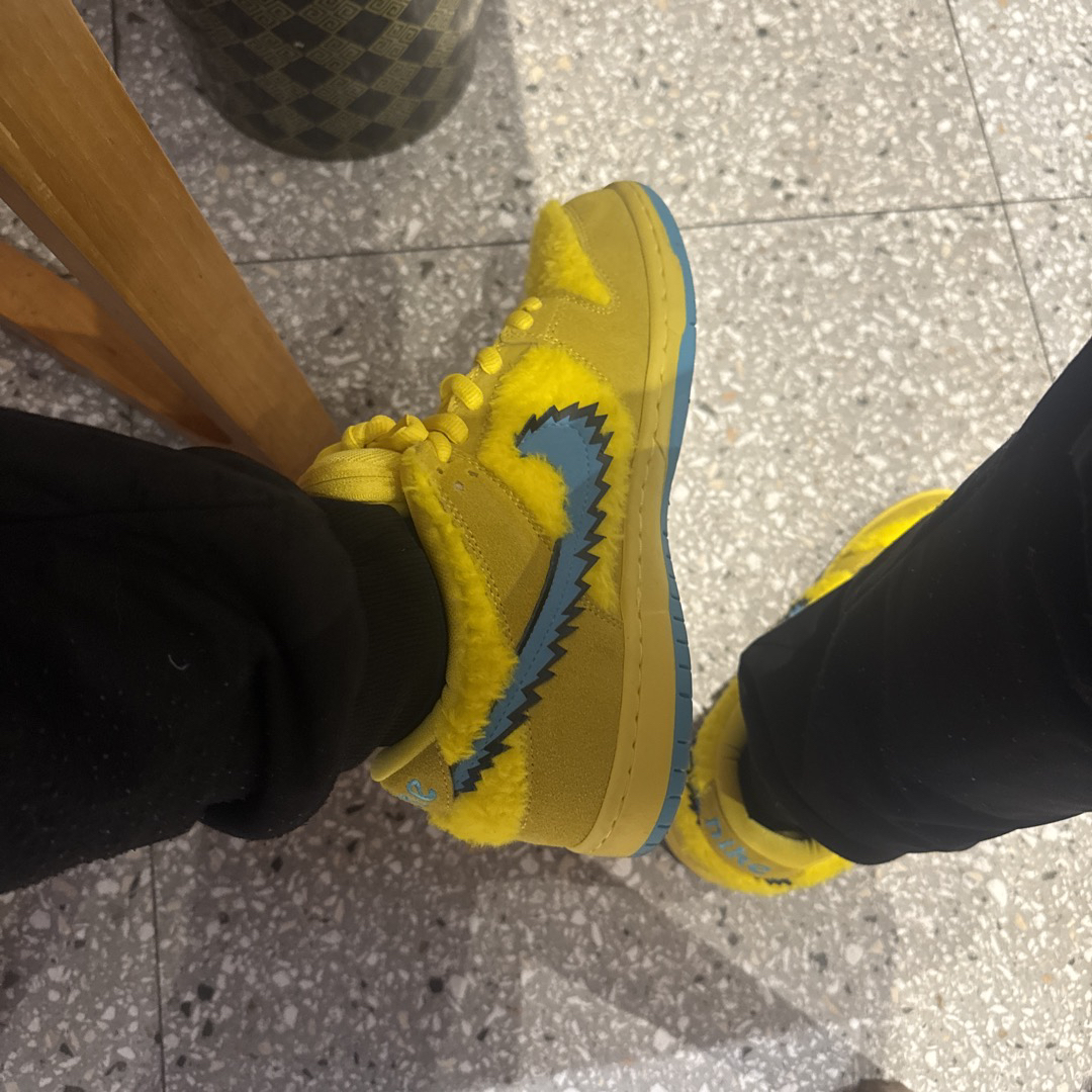 yellow grateful dead dunks on feet