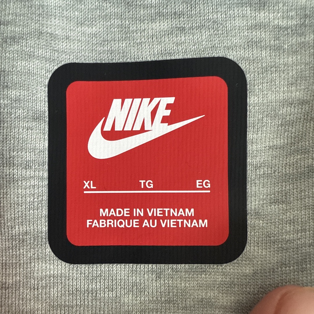 red tag nike meaning