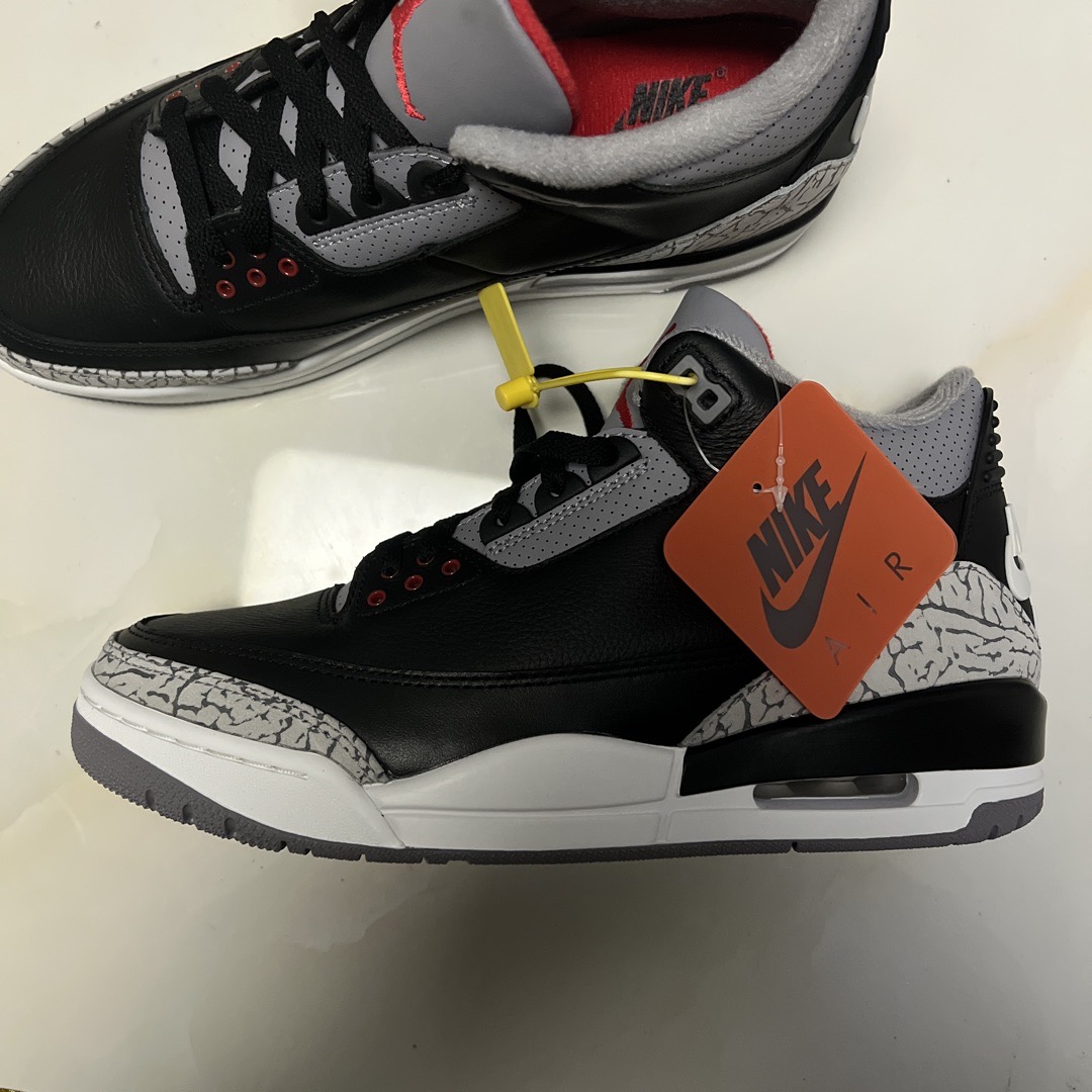 how to tell if black cement 3s are fake
